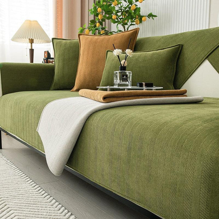 Detailansicht: Antirutsch-Unterseite des Fleece-Sofaschoners für sicheren Halt im Wohnzimmer.
