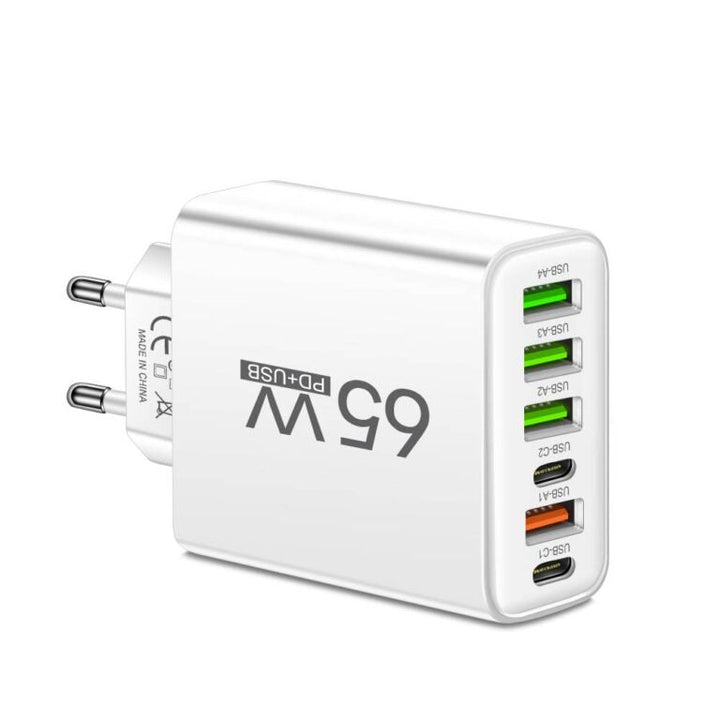 Schwarz PowerMax 65W 6-in-1 USB-C Schnellladegerät für bis zu 6 Geräte gleichzeitig auf dem Schreibtisch.