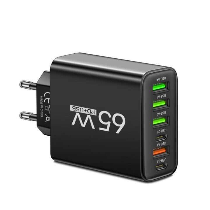 Modernes PowerMax 6-in-1 Schnellladegerät (65W) in Schwarz, das Handy, Tablet und Laptop gleichzeitig lädt.
