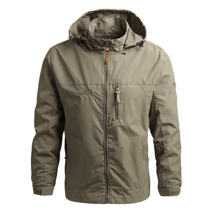 Taktische Herren Outdoorjacke, wasserdicht, mit vielen praktischen Taschen und verstellbaren Ärmelbündchen.