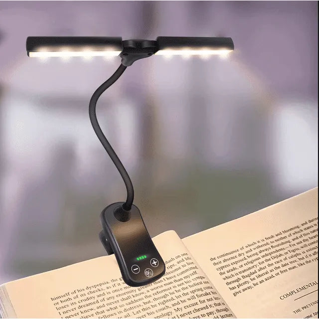 Schwarze, wiederaufladbare Clip-on Buchleuchte für augenschonendes Lesen, dimmbar und tragbar.
