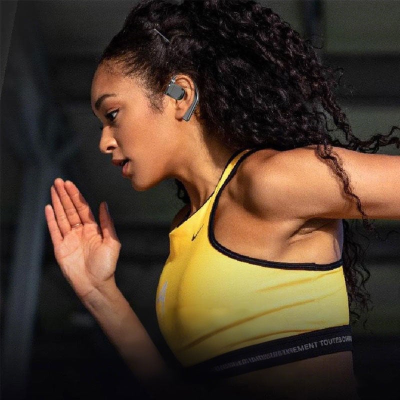 Beiges & schwarzes Open-Ear Bluetooth Headset, komfortabel für Büro & Alltag.