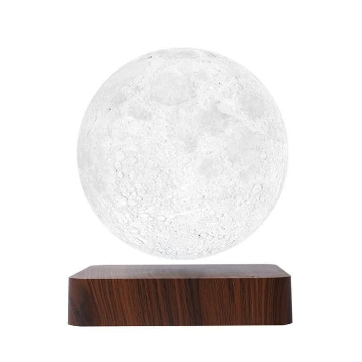 Minimalistisches Design: MOONFLOAT schwebende Mondlampe, eine moderne LED Tischleuchte und Deko-Element mit Farbwechsel.