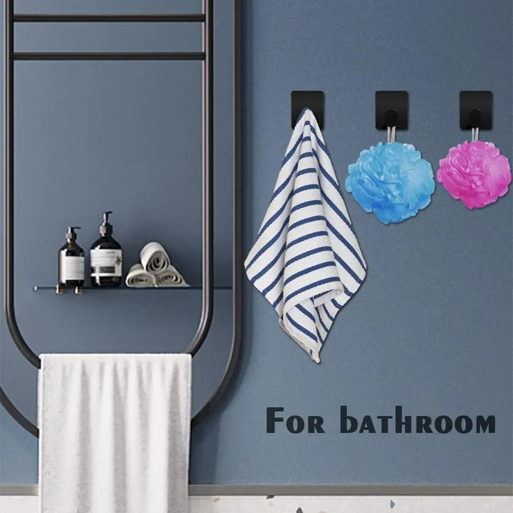 Moderne schwarze Edelstahl Wandhaken, selbstklebend, bohrerfrei. Perfekt für schwere Lasten in Bad & Küche.