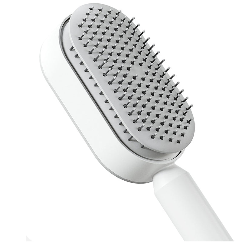 Nahaufnahme der selbstreinigenden 3D-Haarbürste. Zeigt Bürstenkopf mit flexiblen Borsten für Kopfhautmassage.