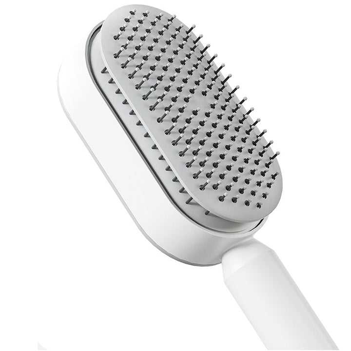 Nahaufnahme der selbstreinigenden 3D-Haarbürste. Zeigt Bürstenkopf mit flexiblen Borsten für Kopfhautmassage.