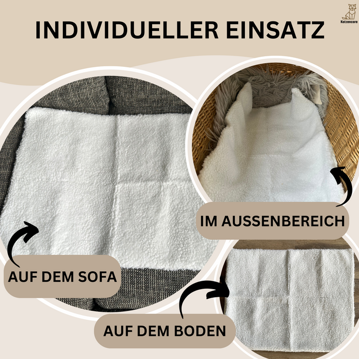 Katze räkelt sich zufrieden auf der selbstwärmenden Katzenmatte WarmPurr™, dem perfekten Tierzubehör.