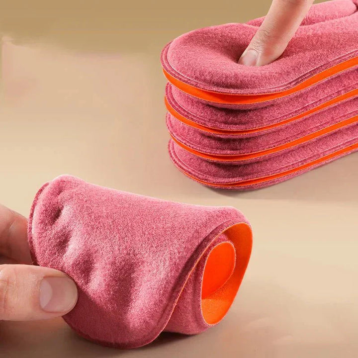 Komfortable, selbstwärmende Einlegesohlen für den Winter, unisex, als Schuhzubehör.