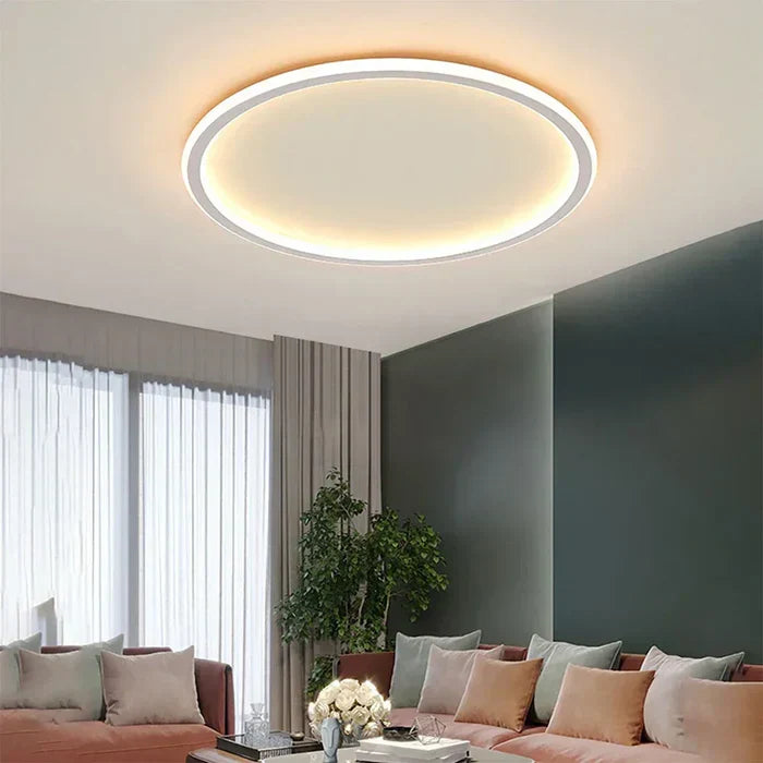 Minimalistische runde LED Deckenlampe im skandinavischen Design, perfekt für helle Innenbeleuchtung.