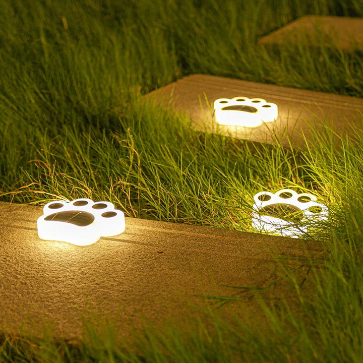 Solar-Gartenbeleuchtung mit Pfotenabdruck-Design, LED-Dekoleuchte für Wege & Garten, wetterfest und langlebig.