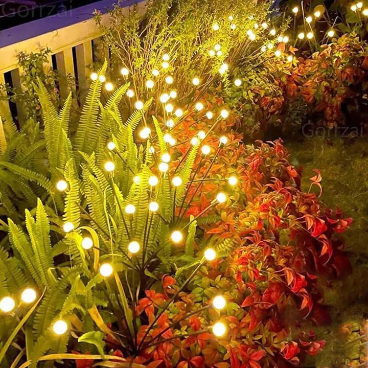Dekorative Solar Glühwürmchen LED Lichter, schaffen eine zauberhafte Atmosphäre im Garten.