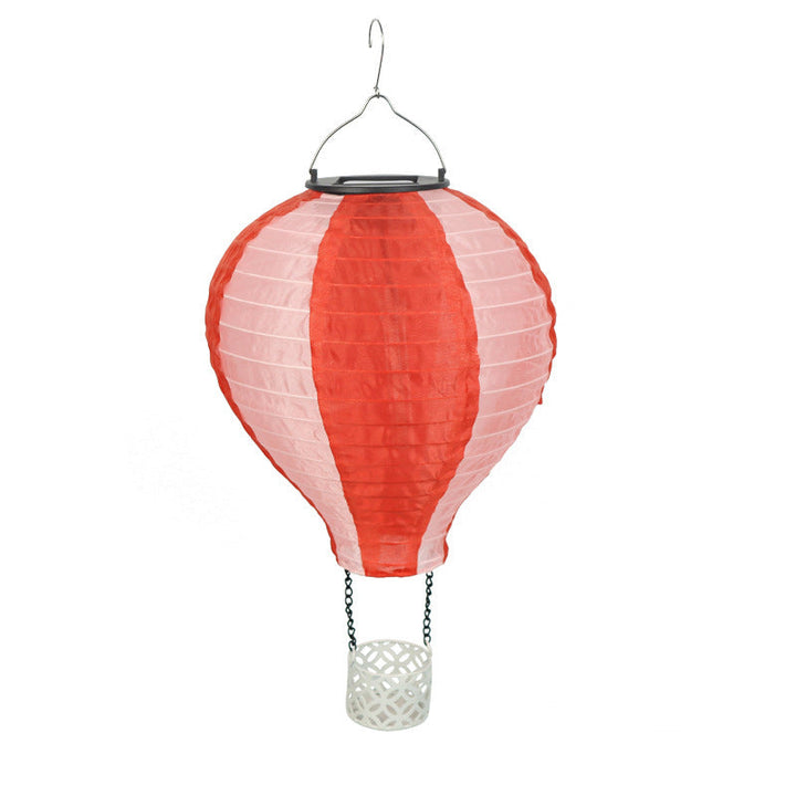 Verwandeln Sie Ihren Außenbereich: Solar-Heißluftballon-LED-Pendelleuchte als stilvolle Dekoleuchte.