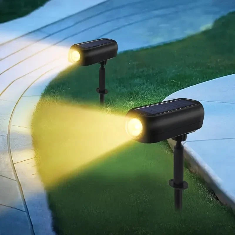 Solar LED Gartenstrahler, wasserdicht, mit Farbwechsel & warmweißem Licht für effektvolle Außenbeleuchtung.