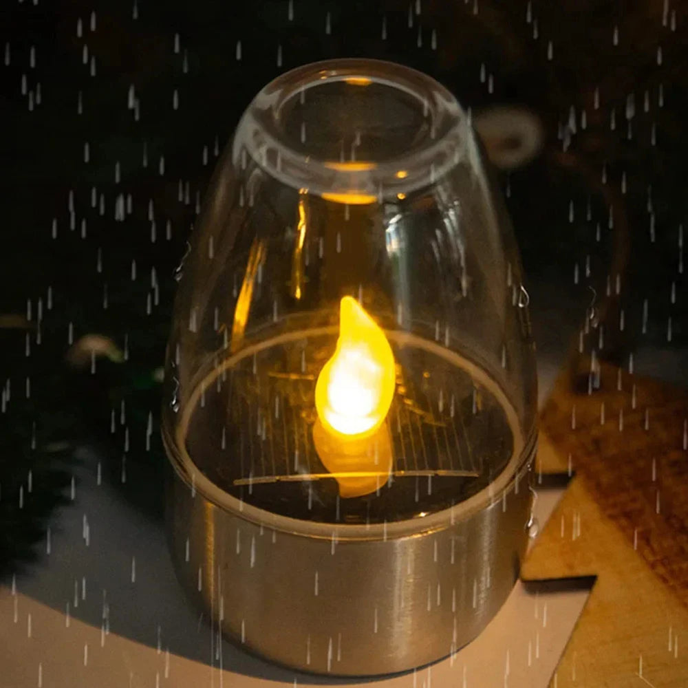 Stilvolles Solar-Kerzenlicht aus Edelstahl mit warmweißem LED für gemütliche Garten- und Terrassenbeleuchtung.