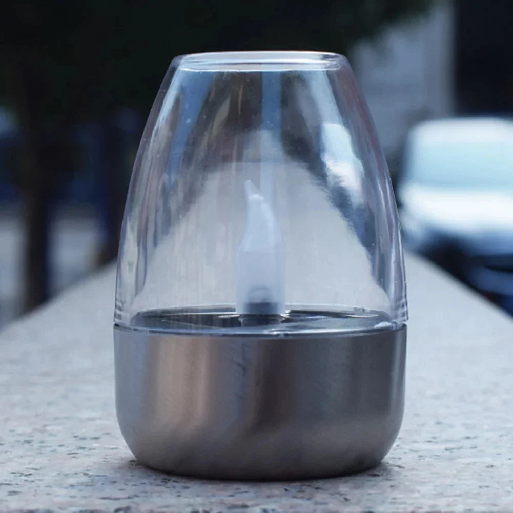 Solarkerzenlicht aus Edelstahl mit warmweißem LED. Kabellos, solarbetrieben, ideal für Garten- & Terrassenlicht.