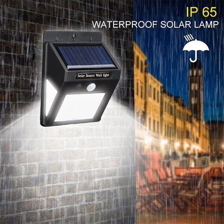 Solar-LED-Wandleuchte montiert an der Hauswand, spendet helles Licht und sorgt für Sicherheit.