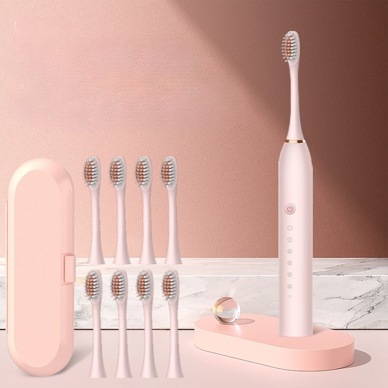 Sonic Zahnbürsten-Set mit Hauptgerät und 8 Ersatzbürstenköpfen, bereit für effektive Mundhygiene.
