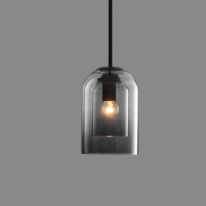 Elegante Pendelleuchte Doppelglas rauchgrau, rostfarben, vielseitig für modernes Wohndesign.