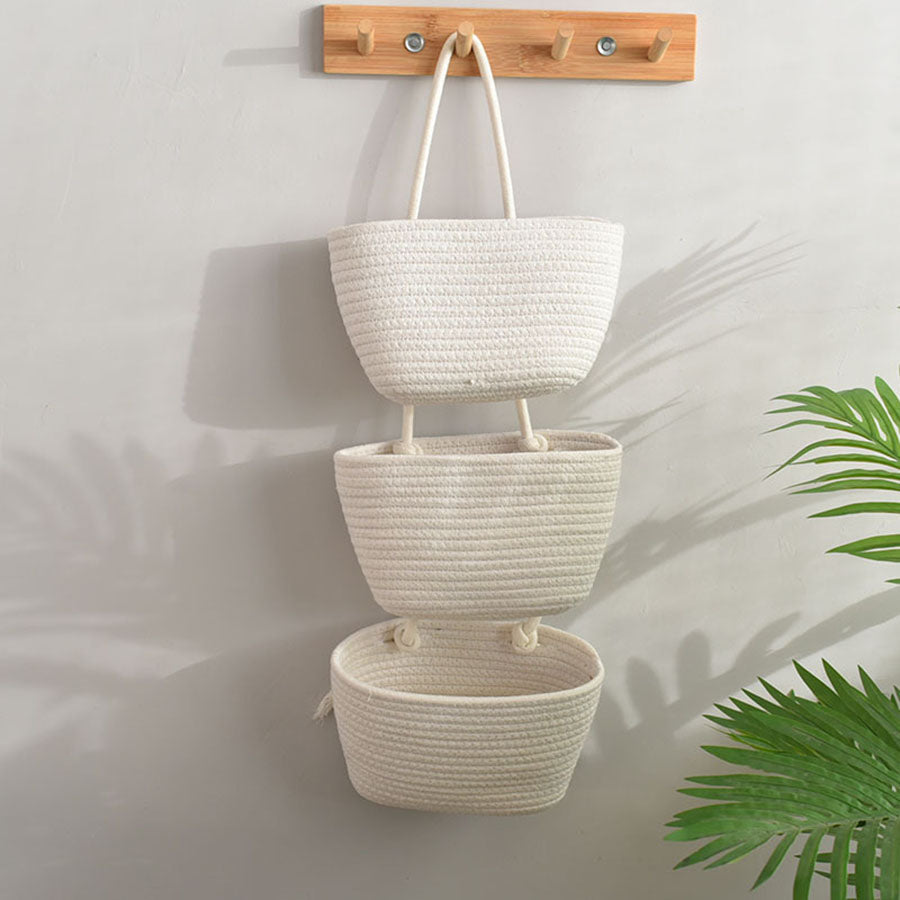 Eleganter Baumwoll Wandorganizer mit 3 Fächern. Praktisches Hängeregal für Ordnung und Wohnaccessoires.