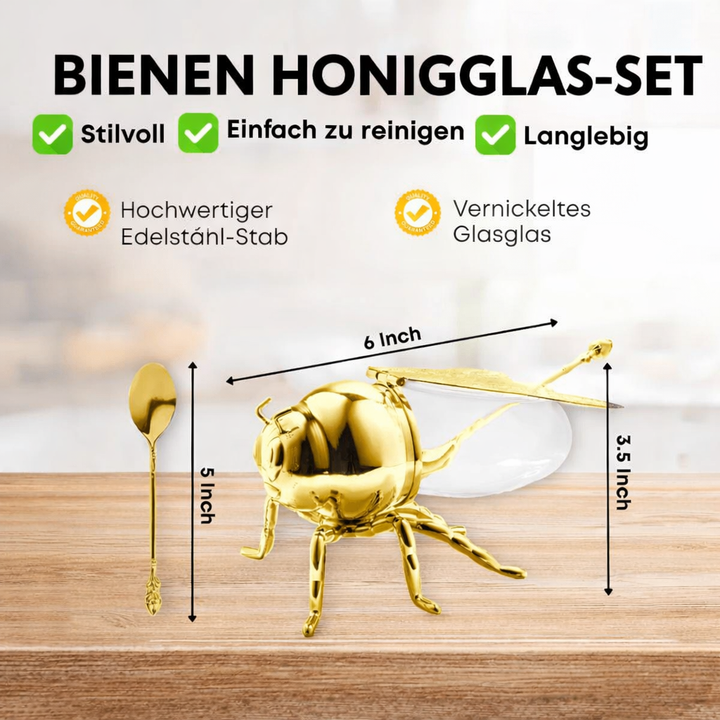 Honigglas-Set mit Glasbehälter und Holzlöffel, perfekt für eine stilvolle Tischdekoration.
