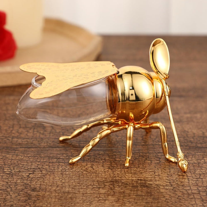 Elegantes Honigglas mit praktischem Honigspender, ideal als stilvolles Küchenaccessoire.