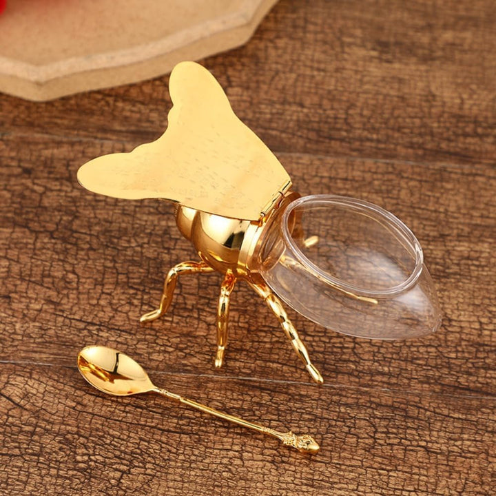 Glas Honigbehälter im Bienen Design mit passendem Löffel, ein Blickfang für jede Küchendekoration.