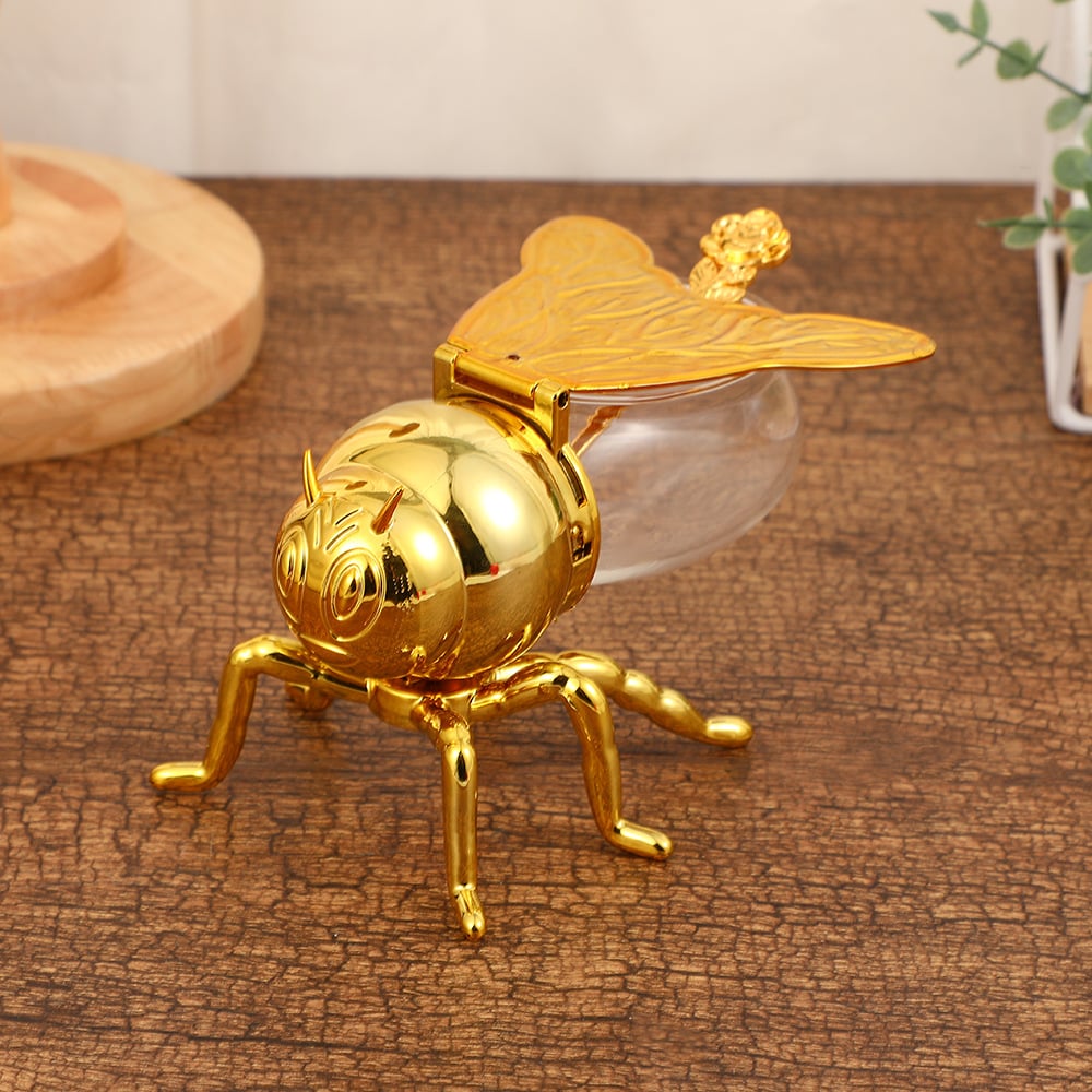 Dekoratives Honigglas mit Bienenmuster, eine charmante Geschenkidee für Honigliebhaber.