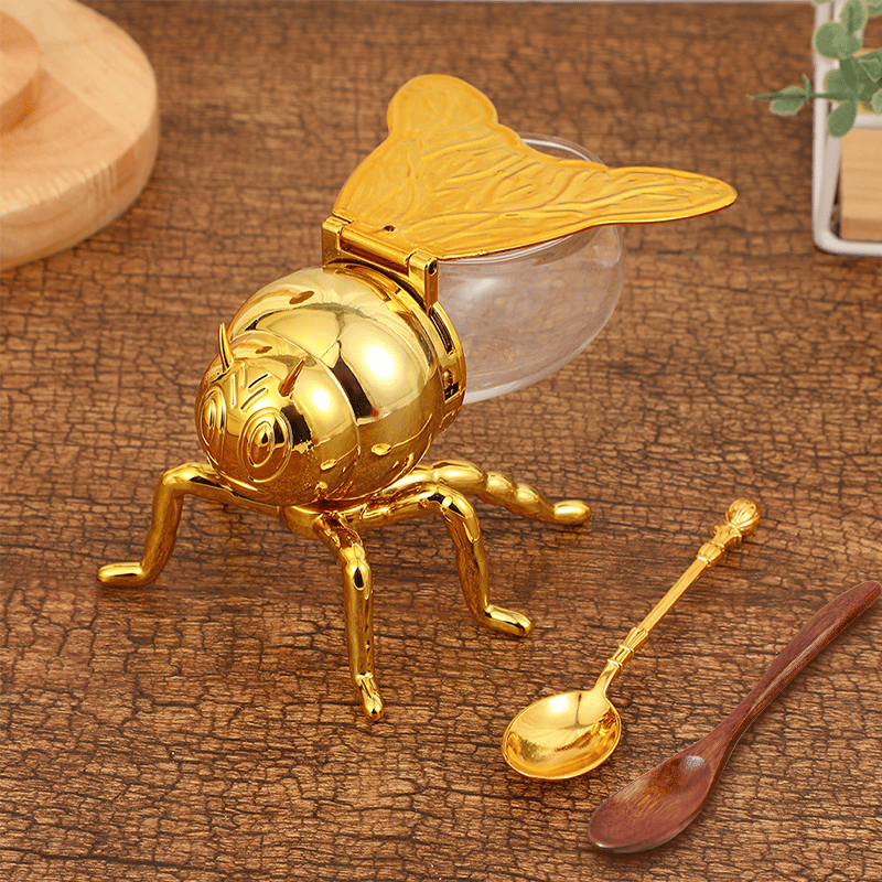 Funktionales Honigglas als Sirupspender verwendbar, mit elegantem Design und passendem Löffel.