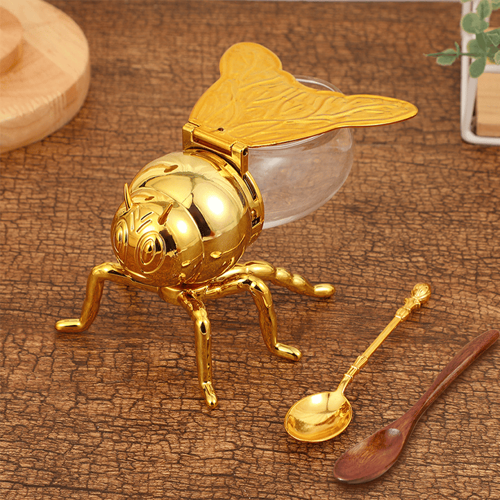 Funktionales Honigglas als Sirupspender verwendbar, mit elegantem Design und passendem Löffel.