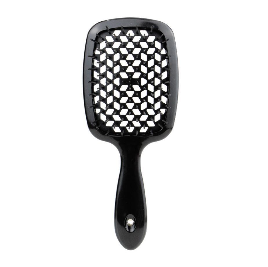 Sanfte TangleFree Haarbürste verhindert Knoten und Haarbruch; sorgt für glattes, gepflegtes Haar bei jeder Routine.