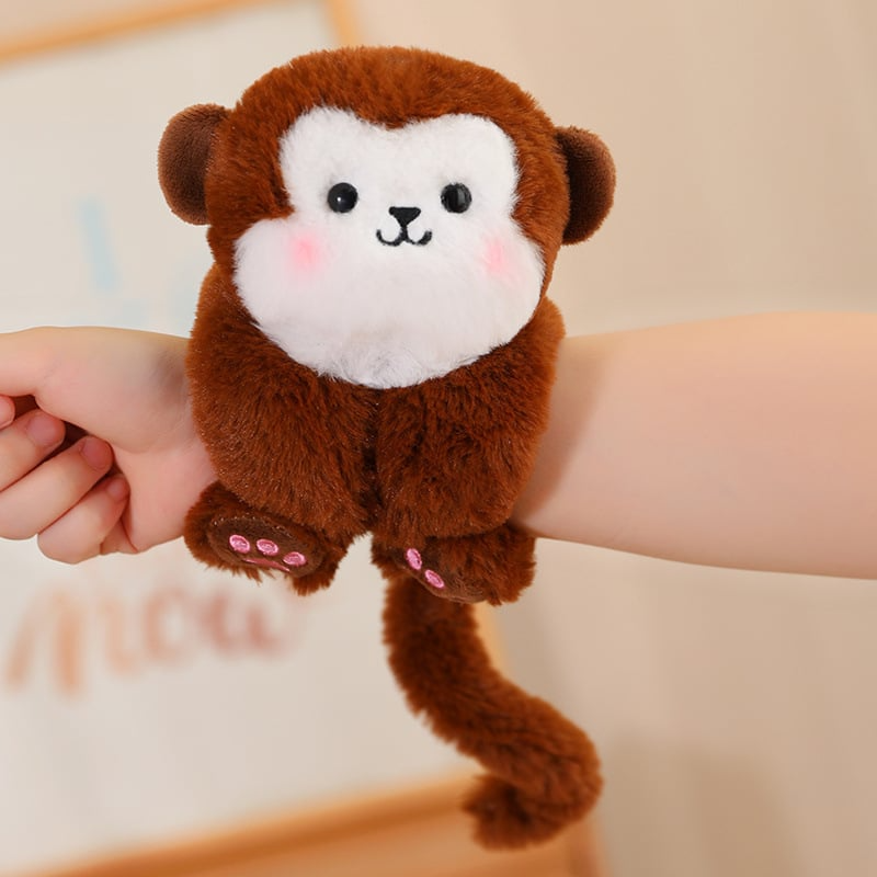 Set aus Plüsch Schnapparmbändern: Shiba Inu, Panda, Dino. Kuschelige Spielzeuge & Accessoires für Kinder.