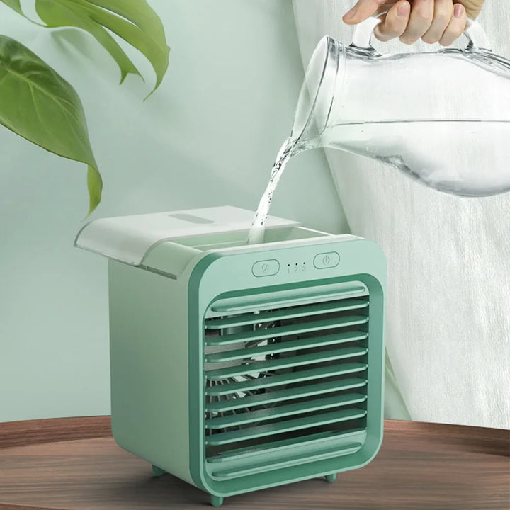Tragbarer 3-in-1 Mini-Luftkühler mit USB-Anschluss, Ventilator und Luftbefeuchter für Abkühlung unterwegs.