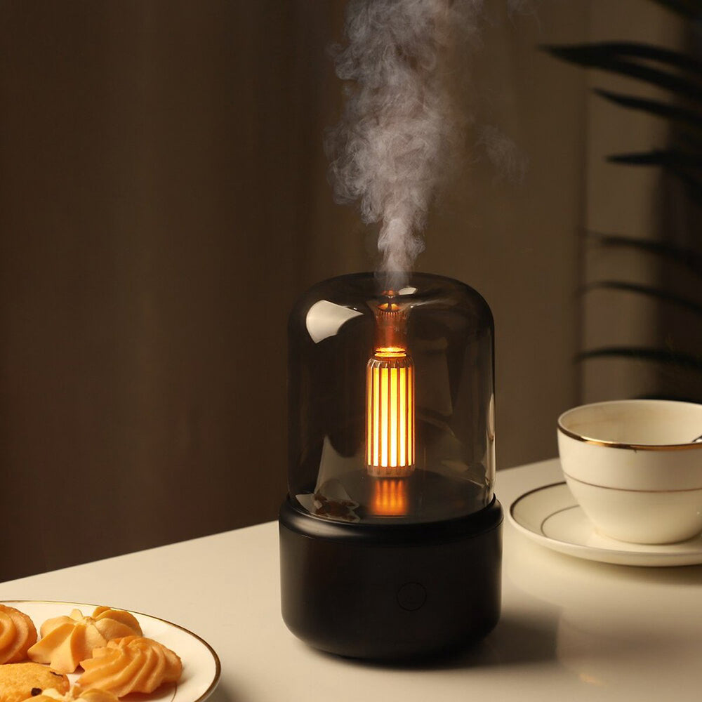 Tragbarer Aroma Diffusor mit realistischem Flammeneffekt für entspannende Aromatherapie und besseres Wohlbefinden.