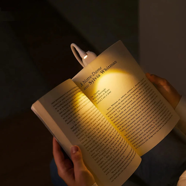 Vielseitiges tragbares LED Buchlicht, dimmbar und augenschonend, für Lesen und als Nachtlicht.