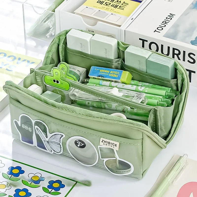 Buntes transparentes Kinder Federmäppchen mit 10 Fächern, ideal für Schule und kreative Momente.