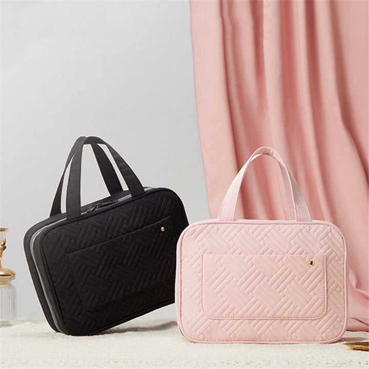 Kompakte Travelique Kulturtasche, unisex, für alle Reiseabenteuer, wasserabweisender Schutz.