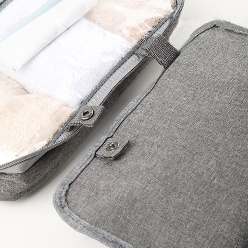 Travelique Kulturtasche, pfirsichhaut-Optik, wasserabweisend, unisex, mit Haken für Badezimmer.