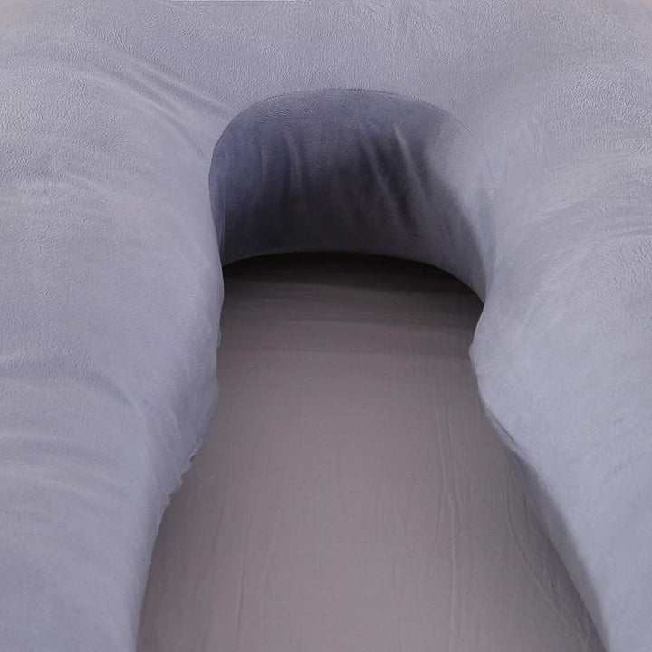 Ergonomisches Seitenschläferkissen für Schwangerschaft, stützt den Babybauch und fördert gesunden Schlaf der Mutter.