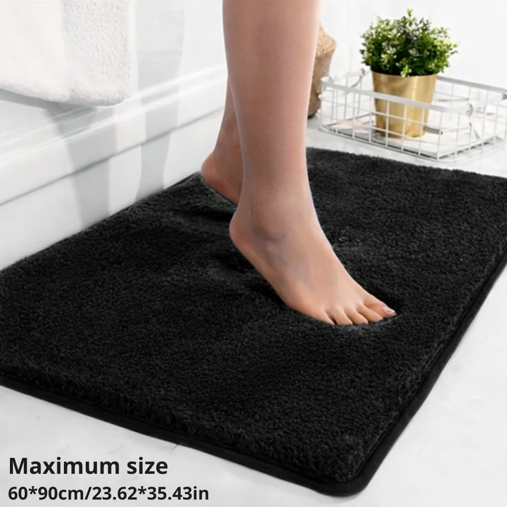 Flauschige Badematte mit Anti-Rutsch-Beschichtung, sicherer Halt nach dem Baden.