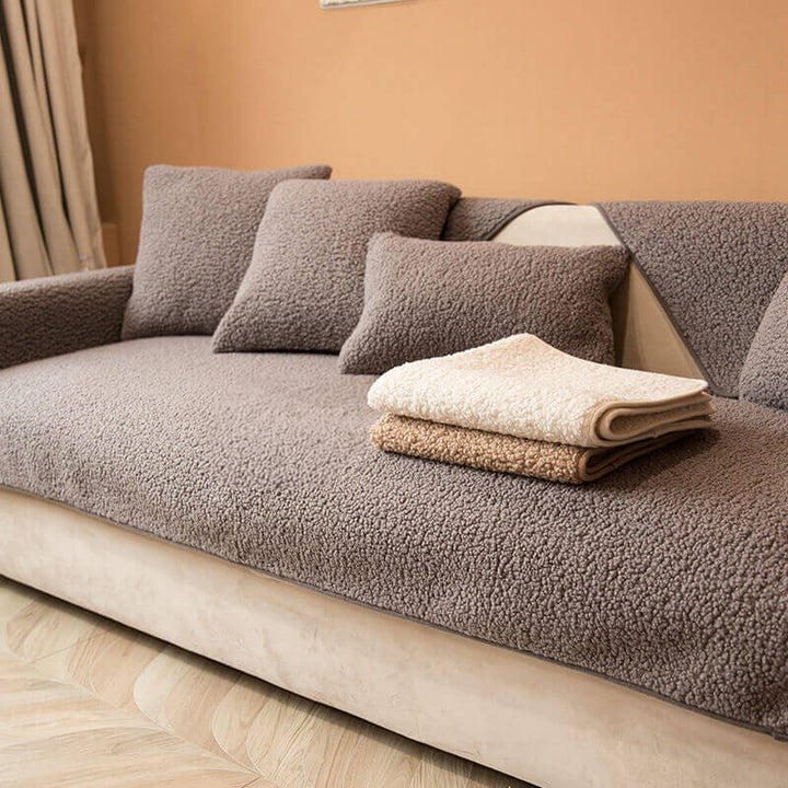 Warmer Teddyfleece Couchschutz, rutschfest & haustierfreundlich, ideal für entspannte Abende.