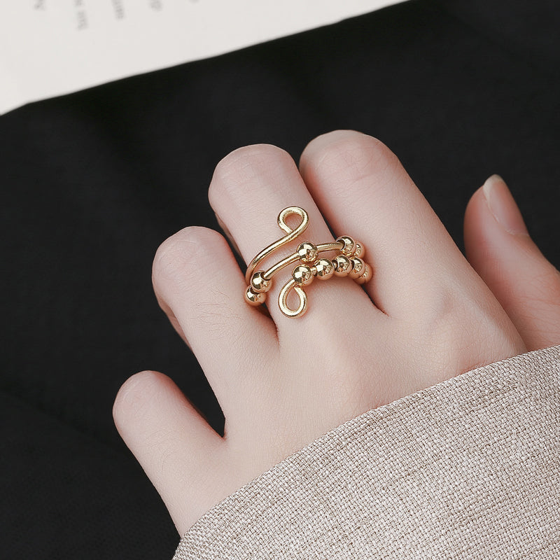 Ideale Geschenkidee: Unisex Fidget Ring mit drehbaren Perlen für Anti-Angst & Stressabbau.