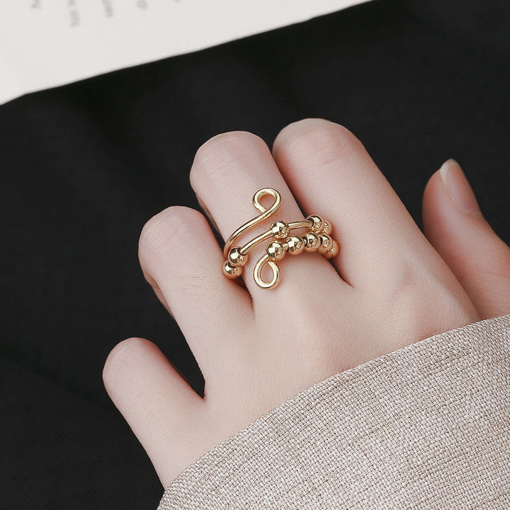 Ideale Geschenkidee: Unisex Fidget Ring mit drehbaren Perlen für Anti-Angst & Stressabbau.