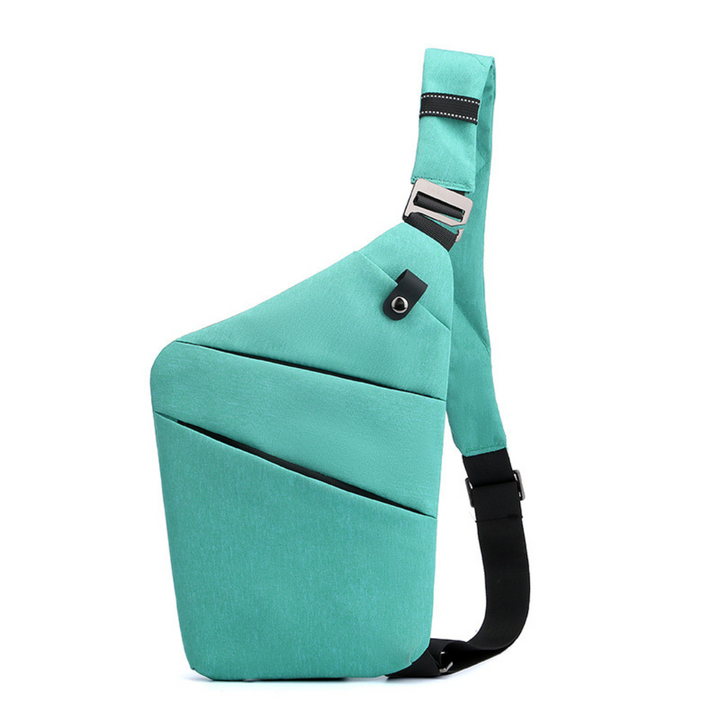 Unisex Anti-Diebstahl Umhängetasche offen auf Tisch. Gut sichtbare, sichere Innenfächer für Geld & Handy.