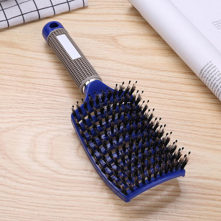 Revolutionäre Anti-Tangle-Bürste, die Knoten ohne Ziepen löst. Optimale Haarpflege für jeden Tag.