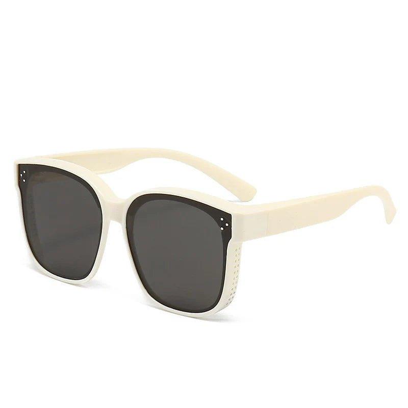Robuste Aufsteck-Sonnenbrille, flexibel anpassbar, bietet UV-Schutz & klare Sicht beim Fahren.