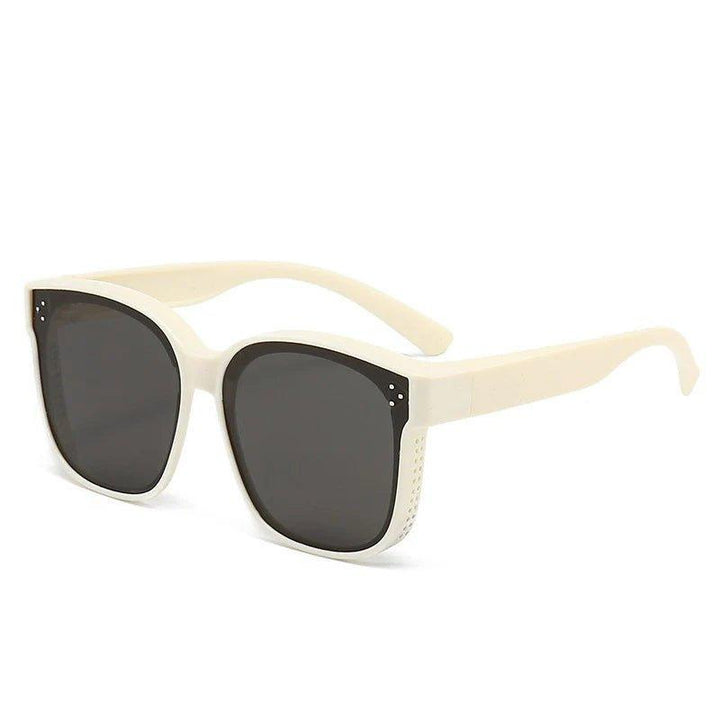 Robuste Aufsteck-Sonnenbrille, flexibel anpassbar, bietet UV-Schutz & klare Sicht beim Fahren.