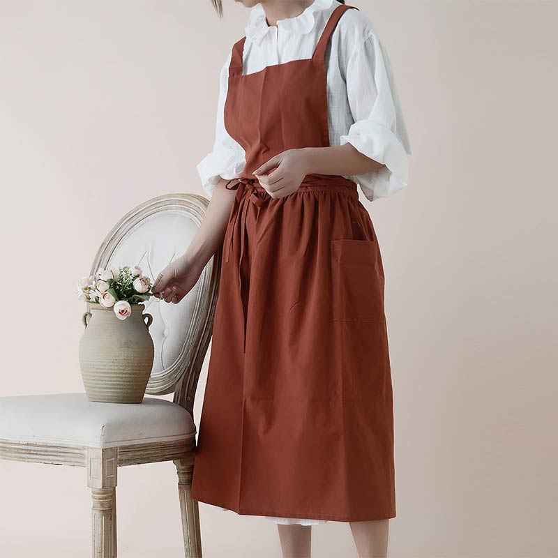 Unisex Küchenzubehör: Hochwertige Baumwollschürze mit Kreuzgurt & geräumigen Taschen.