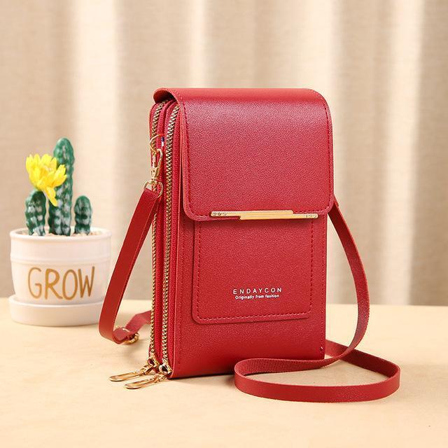 Detailaufnahme der Unisex Crossbody Handy-Geldbörse mit Reißverschlussfächern und Logo.
