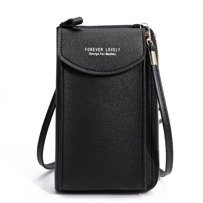 Handygeldbörse Crossbody in Aktion, getragen von einer Frau. Zeigt die praktische Größe.