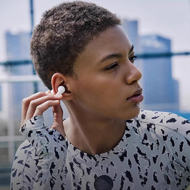 Wasserdichtes In-Ear Bluetooth Sport-Headset, kabellos, sicherer Halt und Top-Sound für aktiven Lifestyle.